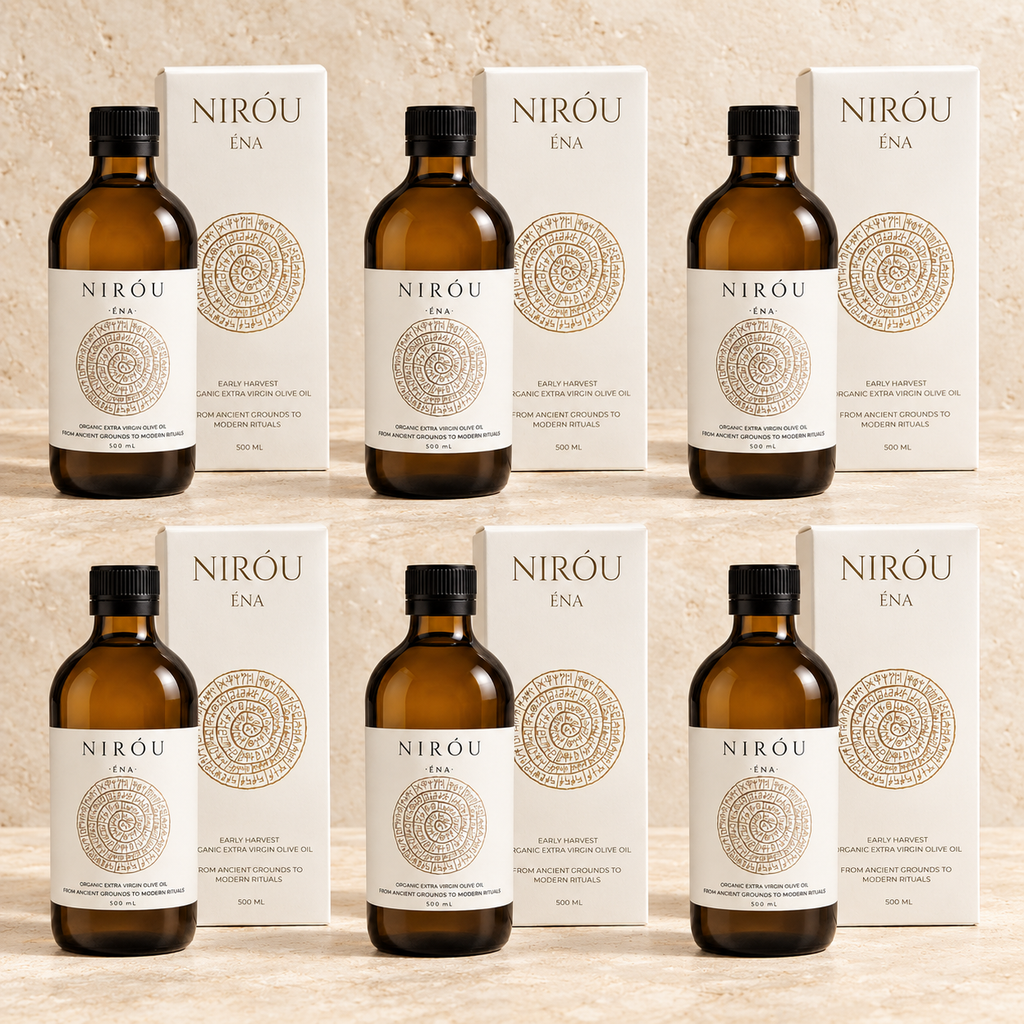 Six NIRÓU ÉNA certified organic extra virgin olive oil bottles and cartons